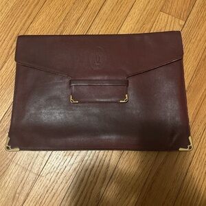 Cartier Burgundy Leather Clutch with Gold Accents